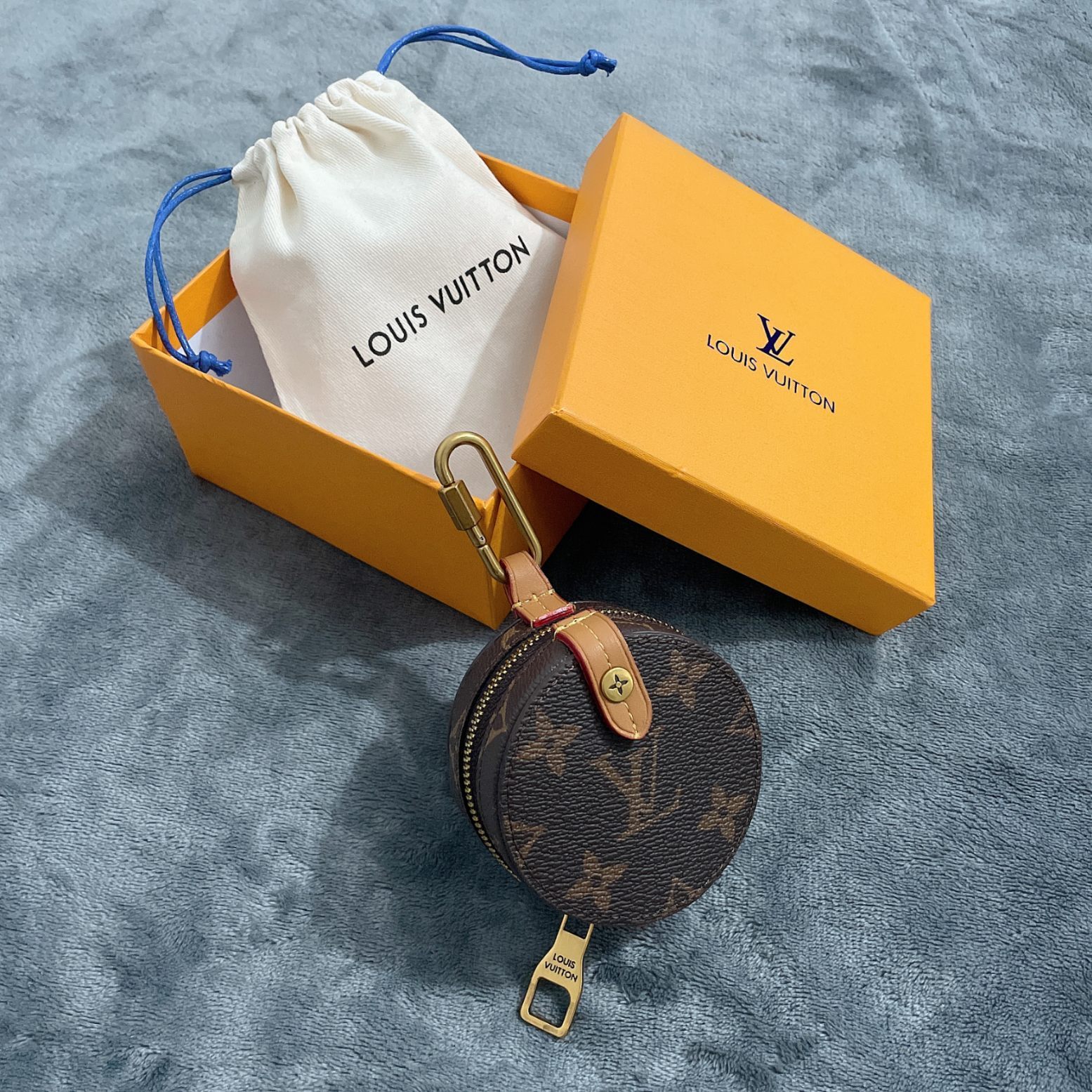 Portafoglio di monete della catena del fascino del monogramma Louis Vuitton L07